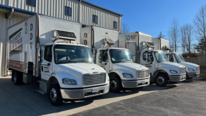 Document Destruction of Virginia mobile shredding trucks parked outside the company facility.